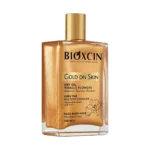 نمای زاویه دیگر روغن بدن بیوکسین Gold On Skin Dry Oil Miracle Flowers
