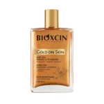 روغن بدن شاین دار BIOXCIN Gold On Skin Dry Oil Miracle Flowers با جلوه درخشان و ترکیبات گیاهی