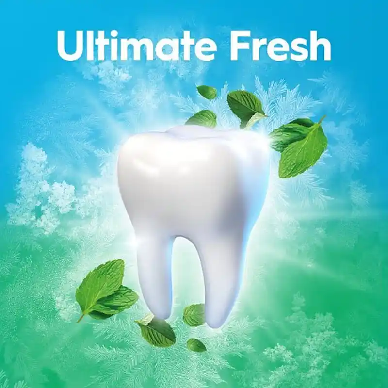 خمیر دندان اورال بی Ultimate Fresh با رایحه خنک نعناع Cool Mint و دندانهای تمیز